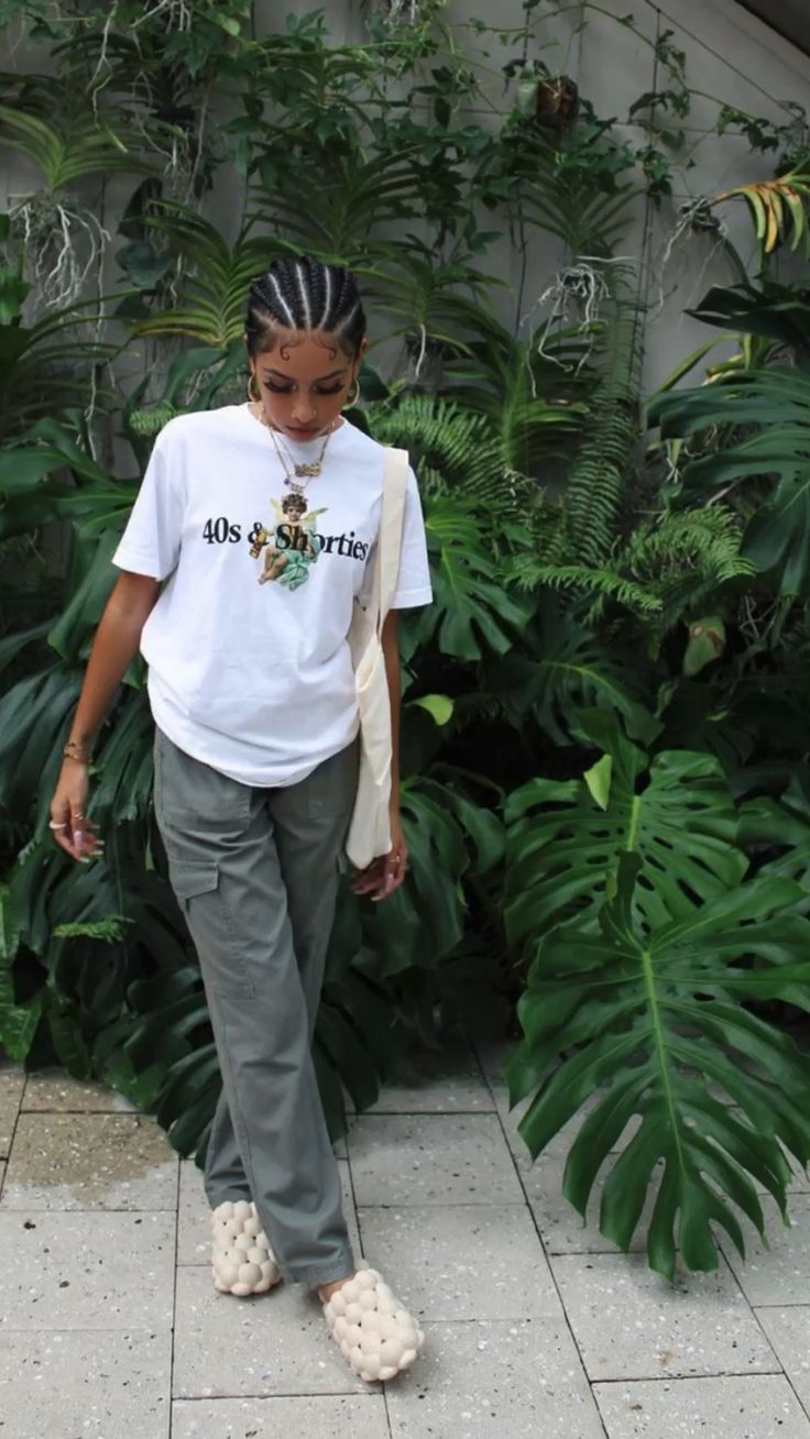 Graphic Tee with Grey Cargo Pants and Beige Bubble Slides